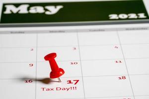 Tax Day concept for May 17 2021 using calendar and note photo