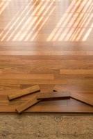 Installation of brazilian cherry hardwood flooring in room