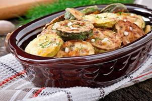 Fried zucchini in an old ceramic bowl photo