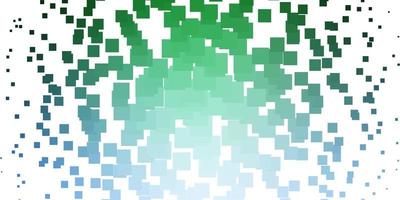 Light Blue, Green vector background in polygonal style.