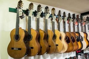 East Grinstead, West Sussex, UK, 2014. Guitars on display in a music shop photo