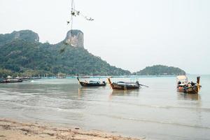 Travel, sea and rocky mountains in Thailand photo