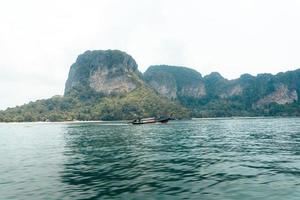 Travel, sea and rocky mountains in Thailand photo