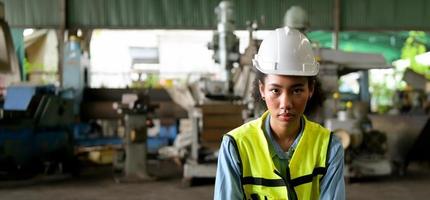 Female chief mechanical engineer work in a mechanical factory photo