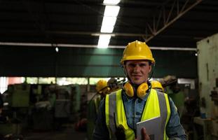 Chief mechanical engineer working in a mechanical factory photo