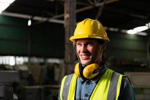 Chief mechanical engineer working in a mechanical factory photo