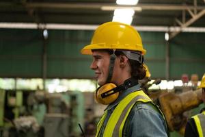 Chief mechanical engineer working in a mechanical factory photo