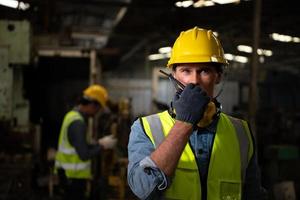 Chief mechanical engineer working in a mechanical factory photo