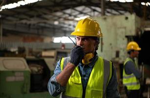 Chief mechanical engineer working in a mechanical factory photo