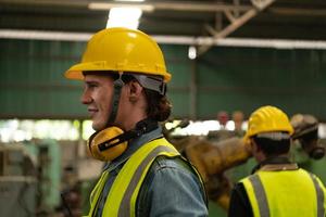 Chief mechanical engineer working in a mechanical factory photo