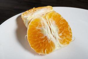 Fresh tangerine murcott on the table. Selective focus. photo