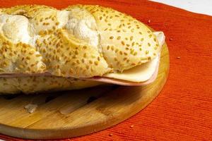 Natural Sandwich on a wooden plate. Selective Focus. photo