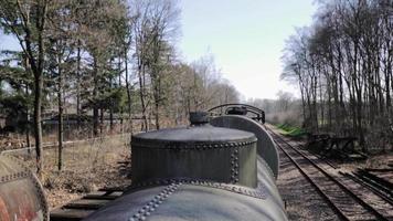 Old Tank Cars on Abandoned Railway Tracks