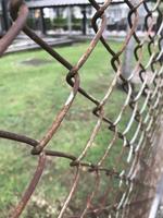 Steel wire mesh to block boundaries as a fence. Divide the boundaries of the area with a fence. photo