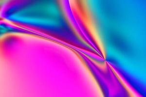 Abstract holographic foil gradient background. Trendy colorful liquid shape 3d render texture. Modern blurred fluid surface photo