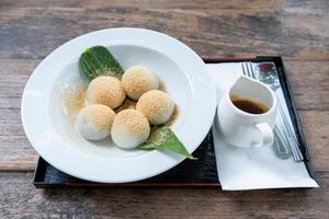 Shiratama Dango Japanese Rice Dumplings with Brown Sugar Syrup and Soybean Powder photo
