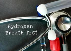 Hydrogen Breath Test word, medical term word with medical concepts in blackboard and medical equipment. photo