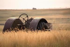 Discarded antique tractor in Saskatchewan photo