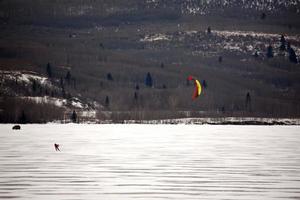 Parachute ice skating in Alberta photo