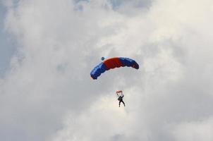 Skydiver coming in to land photo