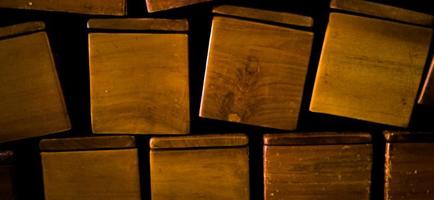 Brown stacked wood box on the corner of room photo