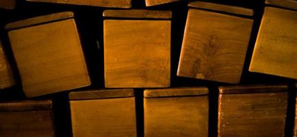 Brown stacked wood box on the corner of room photo