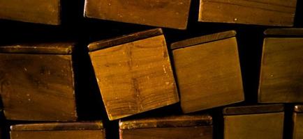 Brown stacked wood box on the corner of room photo