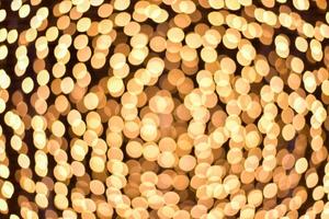 Abstract golden bokeh dark background photo