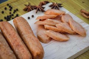 Sausage Or Guan Chiang and Herbs on the board, serving good beer snacks photo