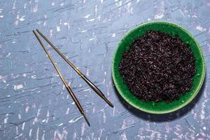 Healthy food black rice in bowl. photo