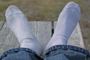 foot rest on a bench photo