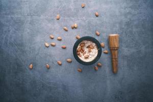 almond powder and almond in a jar on table, photo