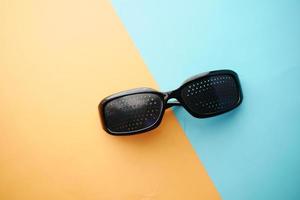 Perforation glasses with holes for training vision photo