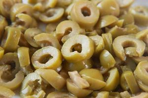 slice of olive in a bowl close up photo