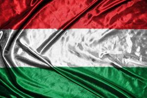 hungary cloth flag Satin Flag Waving Fabric Texture of the Flag photo