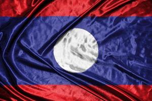 laos cloth flag Satin Flag Waving Fabric Texture of the Flag photo