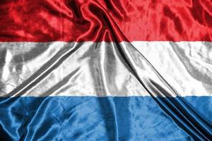 luxembourg cloth flag Satin Flag Waving Fabric Texture of the Flag photo