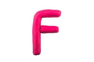 alphabet F English colorful letters Handmade letters molded from plasticine clay on Isolated white background photo