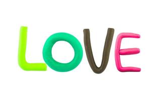 message love Funny plasticine alphabet letters on white background photo