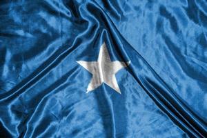 somalia cloth flag Satin Flag Waving Fabric Texture of the Flag photo