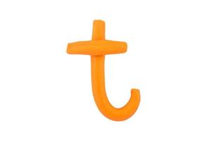 alphabet t English colorful letters Handmade letters molded from plasticine clay on Isolated white background photo