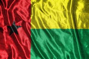 guinea bissau cloth flag Satin Flag Waving Fabric Texture of the Flag photo