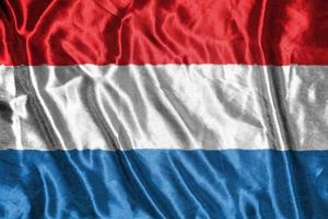 luxembourg cloth flag Satin Flag Waving Fabric Texture of the Flag photo