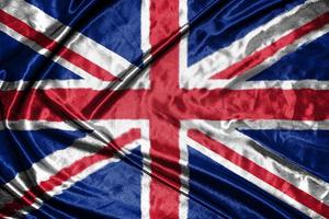 united kingdom cloth flag Satin Flag Waving Fabric Texture of the Flag photo