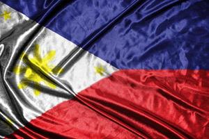 bandera de tela de filipinas bandera de raso ondeando la textura de la tela de la bandera foto