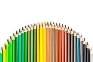 palos de madera multicolores lápices de colores de madera sobre fondo blanco foto
