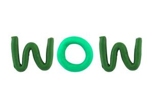 message  wow  Funny plasticine alphabet letters on white background photo