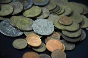 Thai bahts coins on dark background, photo