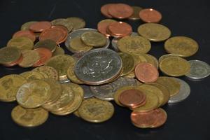 Thai bahts coins on dark background, photo