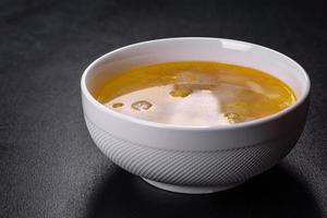 Soup with turkey meatballs, potatoes and vegetables. Selective focus photo